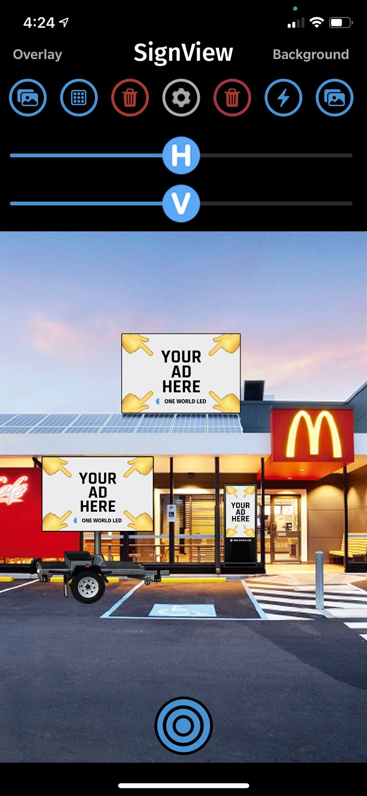 SignView app showing three digital sign mockups placed on a McDonald's drive-thru &mdash; rooftop billboard, trailer-mounted LED, and freestanding totem.